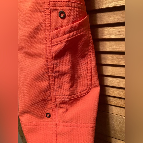 Annika Cutter and Buck Orange Golf Bermuda Shorts - Picture 7 of 12